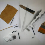 Tools and materials for charcoal drawing.