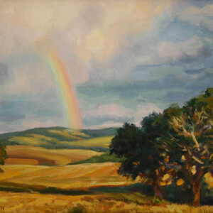 Oil painting of storm clouds and rainbow in eastern idaho.